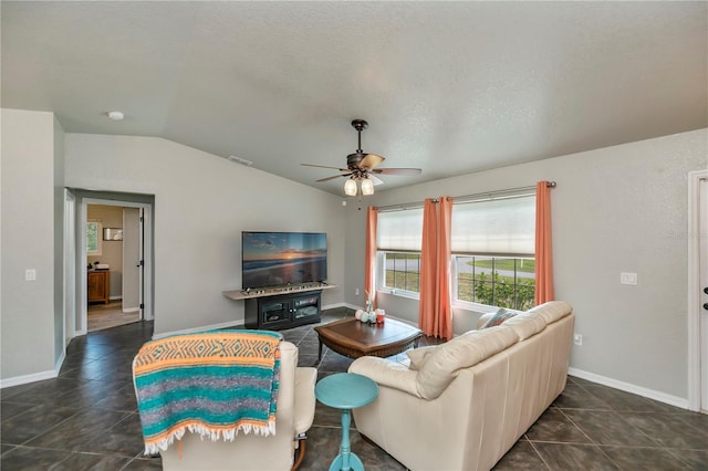 3175 Lakatos St, North Port, FL 34286 - living area featuring baseboards, visible vents, lofted ceiling, a ceiling fan, and dark tile patterned flooring