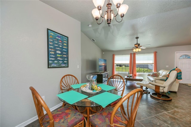 3175 Lakatos St, North Port, FL 34286 - dining room with lofted ceiling, tile patterned floors, baseboards, a textured ceiling, and ceiling fan with notable chandelier