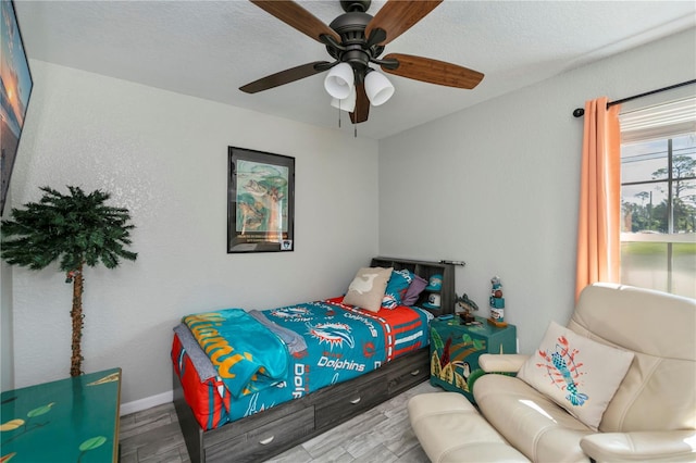 3175 Lakatos St, North Port, FL 34286 - bedroom featuring ceiling fan, baseboards, and wood finished floors