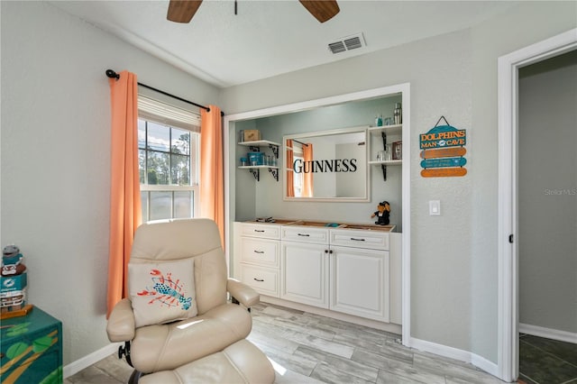 3175 Lakatos St, North Port, FL 34286 - living area featuring ceiling fan, baseboards, and visible vents