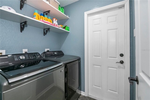 3175 Lakatos St, North Port, FL 34286 - laundry room featuring a textured wall, independent washer and dryer, and laundry area