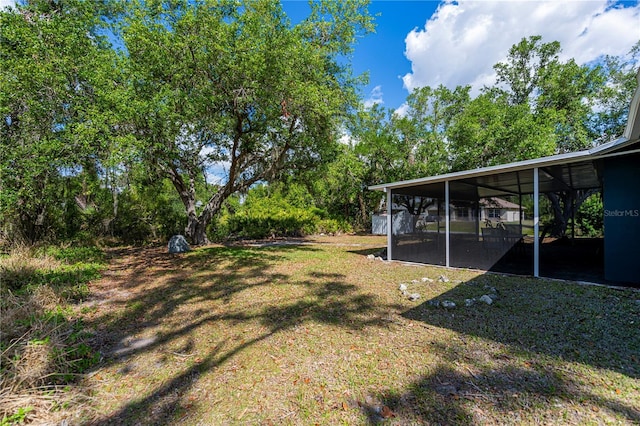 3175 Lakatos St, North Port, FL 34286 - view of yard featuring a sunroom