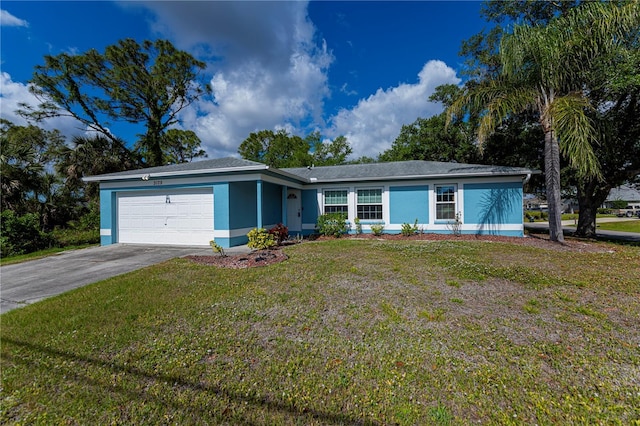 3175 Lakatos St, North Port, FL 34286 - ranch-style house with stucco siding, an attached garage, driveway, and a front lawn