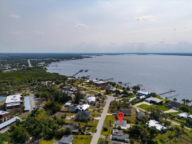 bird's eye view with a residential view and a water view