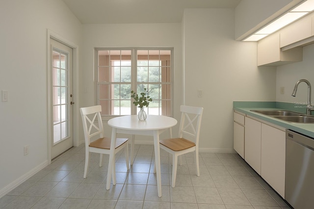 29211 Picador St, Punta Gorda, FL 33982 - dining space with healthy amount of natural light, light tile patterned floors, and baseboards