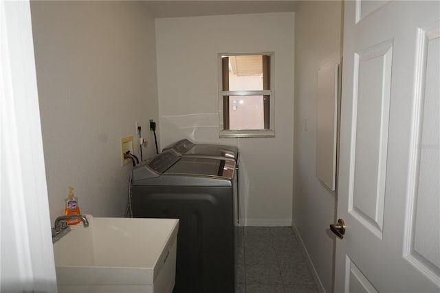 29211 Picador St, Punta Gorda, FL 33982 - clothes washing area featuring independent washer and dryer, tile patterned flooring, and baseboards