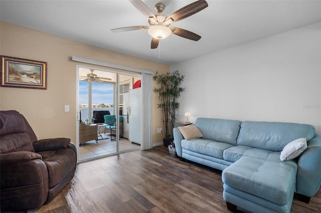 26290 Rampart Blvd Unit D, Punta Gorda, FL 33983 - living room with a ceiling fan and wood finished floors