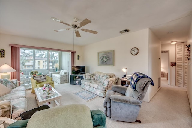 1432 Tropic Ter Unit 1432, North Fort Myers, FL 33903 - living room featuring carpet flooring and ceiling fan