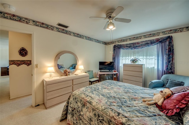 1432 Tropic Ter Unit 1432, North Fort Myers, FL 33903 - bedroom featuring light carpet and ceiling fan
