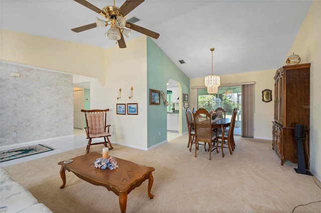 4461 La France Ave, North Port, FL 34286 - living area featuring a chandelier, ceiling fan, baseboards, and high vaulted ceiling
