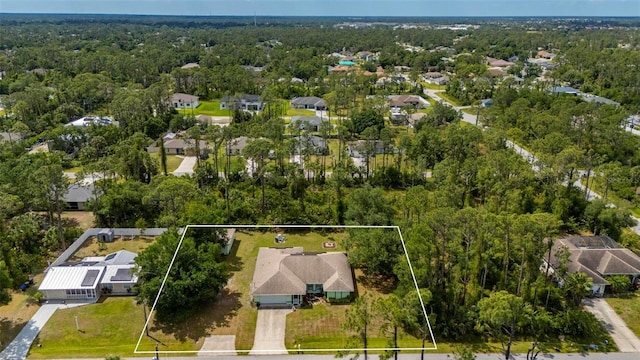 4461 La France Ave, North Port, FL 34286 - aerial view of residential area featuring property parcel outlined and a forest