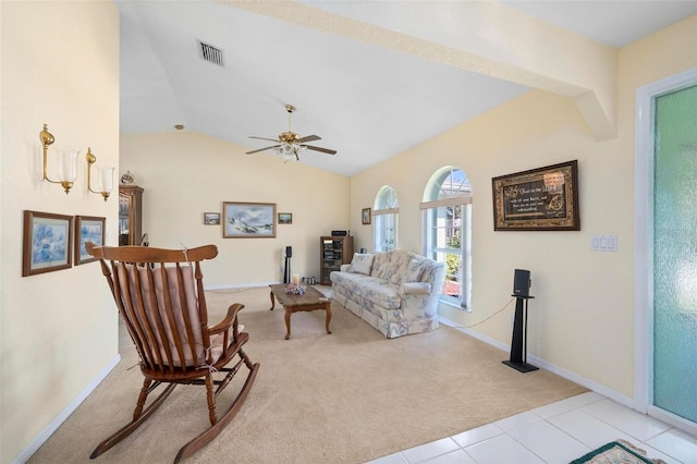 4461 La France Ave, North Port, FL 34286 - living room with light carpet, vaulted ceiling, baseboards, and a ceiling fan