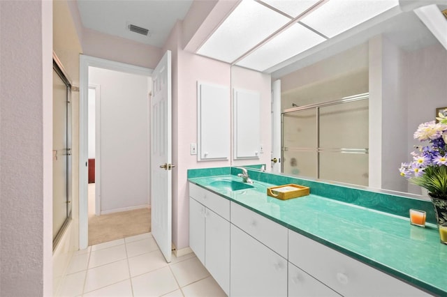 4461 La France Ave, North Port, FL 34286 - bathroom with vanity and tile patterned flooring