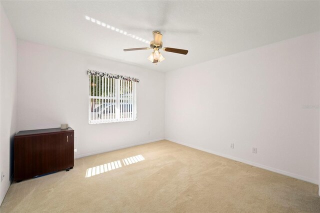 4461 La France Ave, North Port, FL 34286 - spare room featuring carpet flooring, ceiling fan, and baseboards