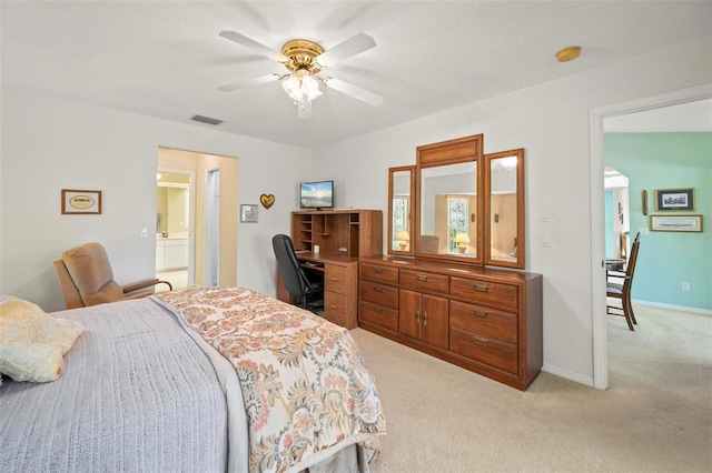 4461 La France Ave, North Port, FL 34286 - bedroom with light colored carpet, a desk, ceiling fan, and baseboards
