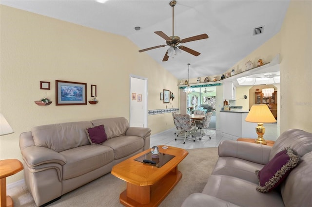 4461 La France Ave, North Port, FL 34286 - living room with ceiling fan, vaulted ceiling, baseboards, and light tile patterned flooring