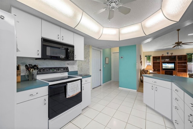 4461 La France Ave, North Port, FL 34286 - kitchen featuring black microwave, white range with electric stovetop, ceiling fan, light tile patterned flooring, and tasteful backsplash