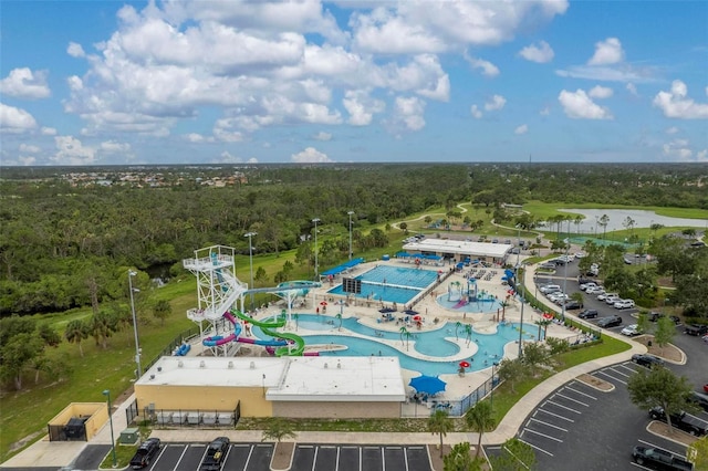 4461 La France Ave, North Port, FL 34286 - bird's eye view of a nearby body of water, a heavily wooded area, and a pool area