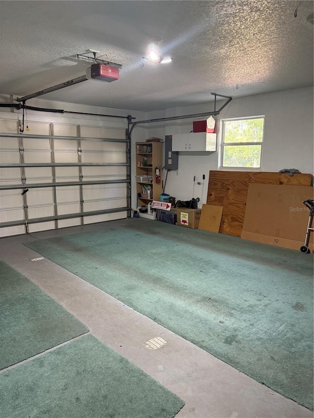4461 La France Ave, North Port, FL 34286 - garage featuring a garage door opener and electric panel