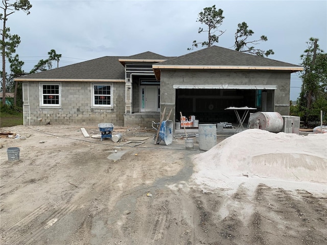 139 Hardee Way, Rotonda West, FL 33947 - property in mid-construction with roof with shingles and a garage