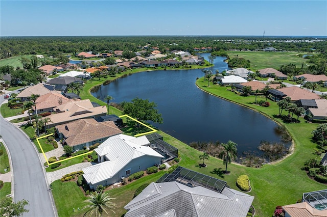 bird's eye view with a water view and a residential view