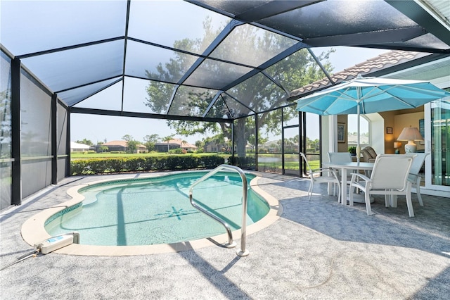 pool featuring a patio, glass enclosure, and outdoor dining area