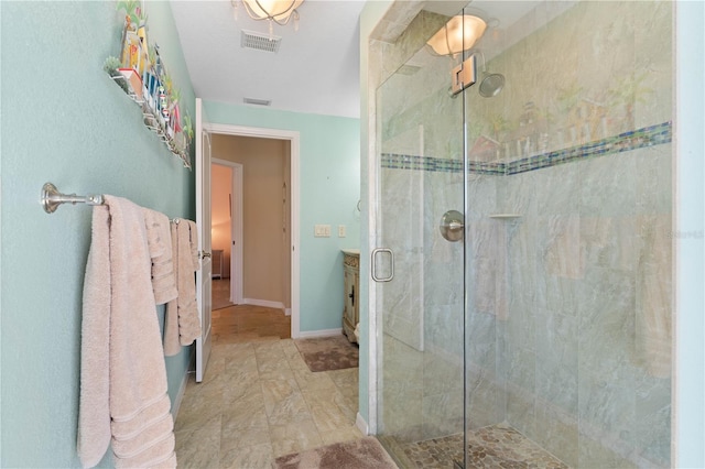 full bath featuring visible vents and a shower stall