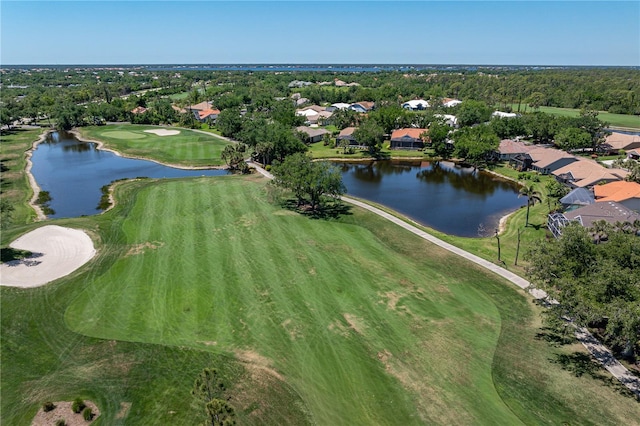 bird's eye view featuring a water view, a residential view, and view of golf course