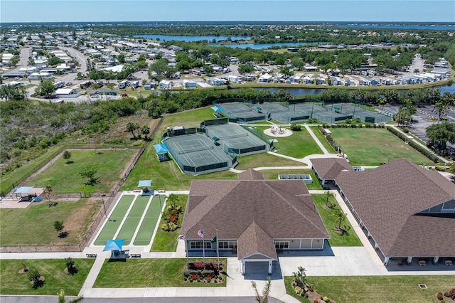 aerial view featuring a residential view and a water view