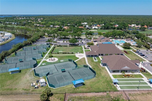birds eye view of property with a water view
