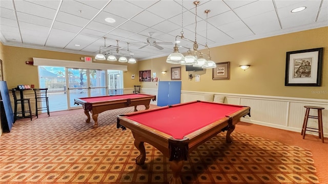 recreation room featuring wainscoting, carpet flooring, ornamental molding, and billiards
