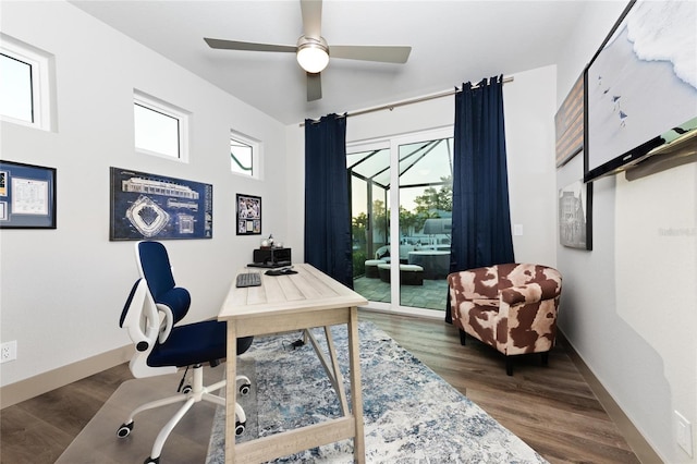 home office with baseboards, a ceiling fan, and wood finished floors