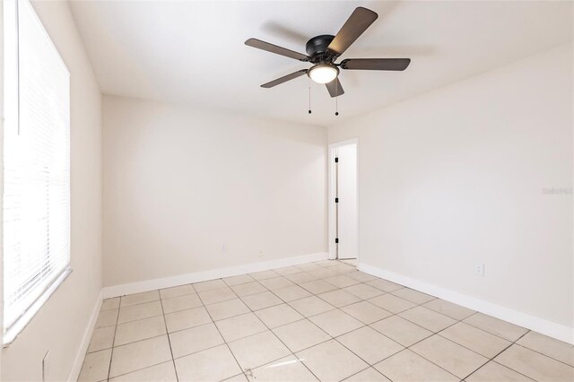 1665 Florence Ave Unit B, Englewood, FL 34223 - unfurnished room featuring ceiling fan, baseboards, and light tile patterned floors
