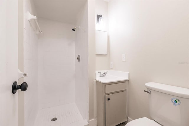 1665 Florence Ave Unit B, Englewood, FL 34223 - bathroom with vanity, toilet, and tiled shower
