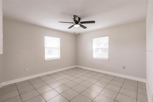 1665 Florence Ave Unit B, Englewood, FL 34223 - spare room featuring a ceiling fan, baseboards, and light tile patterned floors