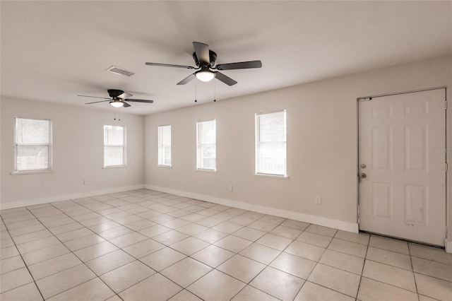 1665 Florence Ave Unit B, Englewood, FL 34223 - spare room with baseboards, a ceiling fan, visible vents, and light tile patterned floors