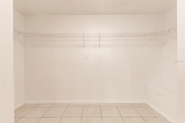 1665 Florence Ave Unit B, Englewood, FL 34223 - spacious closet with light tile patterned floors