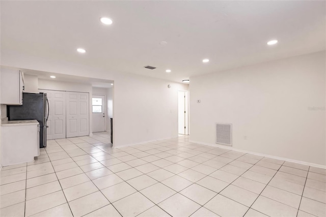 1665 Florence Ave Unit B, Englewood, FL 34223 - unfurnished room with light tile patterned floors, visible vents, and recessed lighting