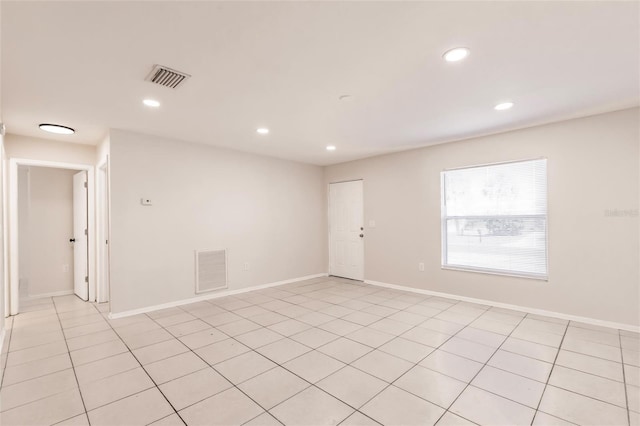 1665 Florence Ave Unit B, Englewood, FL 34223 - empty room featuring baseboards, visible vents, recessed lighting, and light tile patterned floors