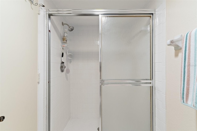 bathroom featuring a stall shower