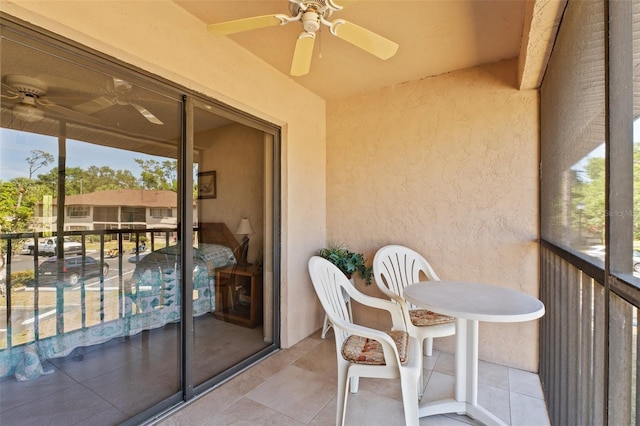 balcony featuring ceiling fan