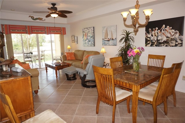 1295 Saxony Cir Unit 2101, Punta Gorda, FL 33983 - dining space featuring ceiling fan with notable chandelier, light tile patterned floors, and crown molding