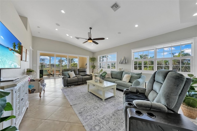living room featuring a ceiling fan, recessed lighting, visible vents, light tile patterned flooring, and vaulted ceiling