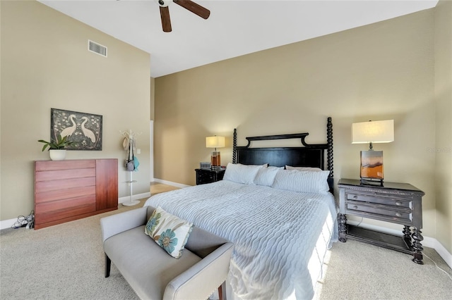 bedroom featuring carpet, visible vents, baseboards, and a ceiling fan