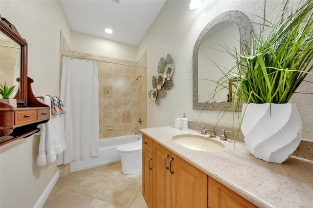 full bath with vanity, toilet, tile patterned flooring, and shower / bath combo