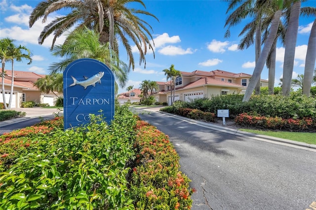 community / neighborhood sign featuring a residential view