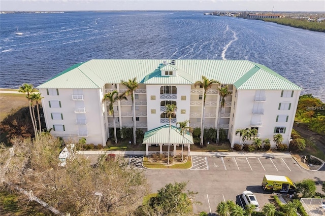 birds eye view of property featuring a water view