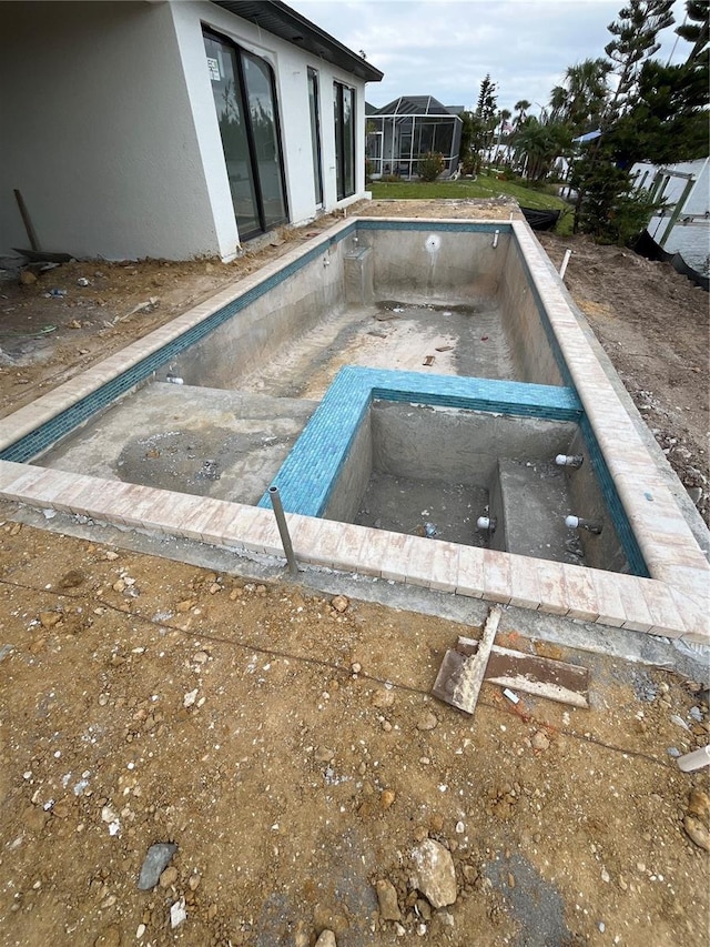 10522 Riverside Rd, Port Charlotte, FL 33981 - view of swimming pool featuring an empty pool