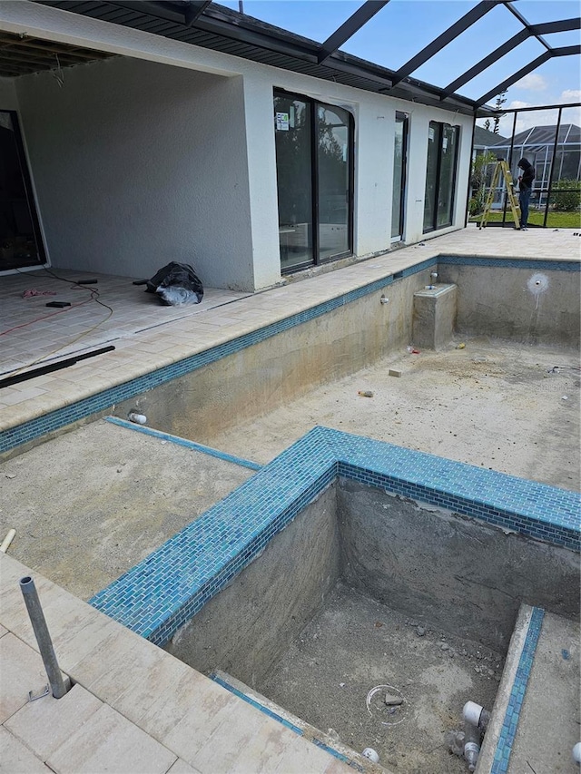 10522 Riverside Rd, Port Charlotte, FL 33981 - view of swimming pool with a lanai and a patio area