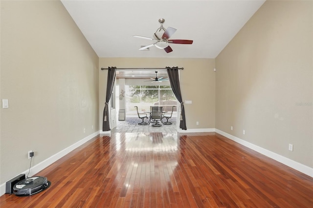 1811 Irving Ave, Lehigh Acres, FL 33972 - empty room featuring a ceiling fan, hardwood / wood-style flooring, and baseboards